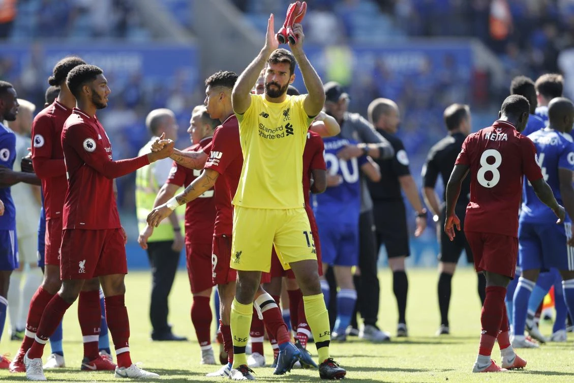 Liverpool's Brazilian goalkeeper Alisson Becker gestures after the final whistle during the English Premier League football match between Leicester City and Liverpool at King Power Stadium in Leicester, central England on September 1, 2018. (AFP)