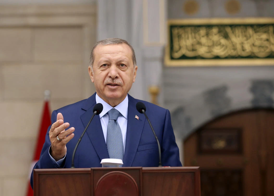 Turkish President Recep Tayyip Erdogan speaks during the opening ceremony for the newly built Serahsi Mosque in Bishkek, Kyrgyzstan, Sunday, Sept. 2, 2018. (Presidential Press Service via AP)