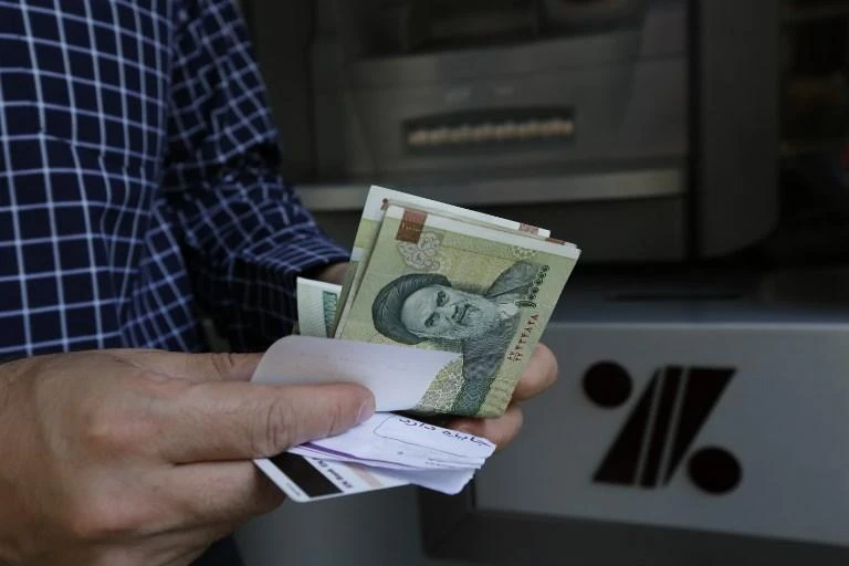 The currency has been volatile for months because of a weak Iranian economy. (AFP)