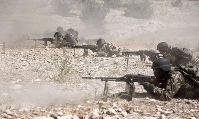 Fighters of the National Liberation Front prepare in anticipation of an attack by the regime on Idlib province and the surrounding countryside, near Idlib on September 3, 2018. (AFP)