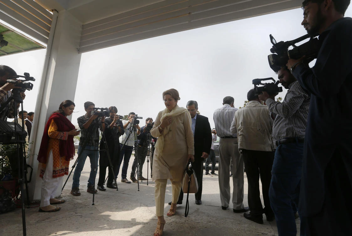 Lawmakers arrive to cast their votes for presidential election at parliament in Islamabad, Pakistan. (AP)