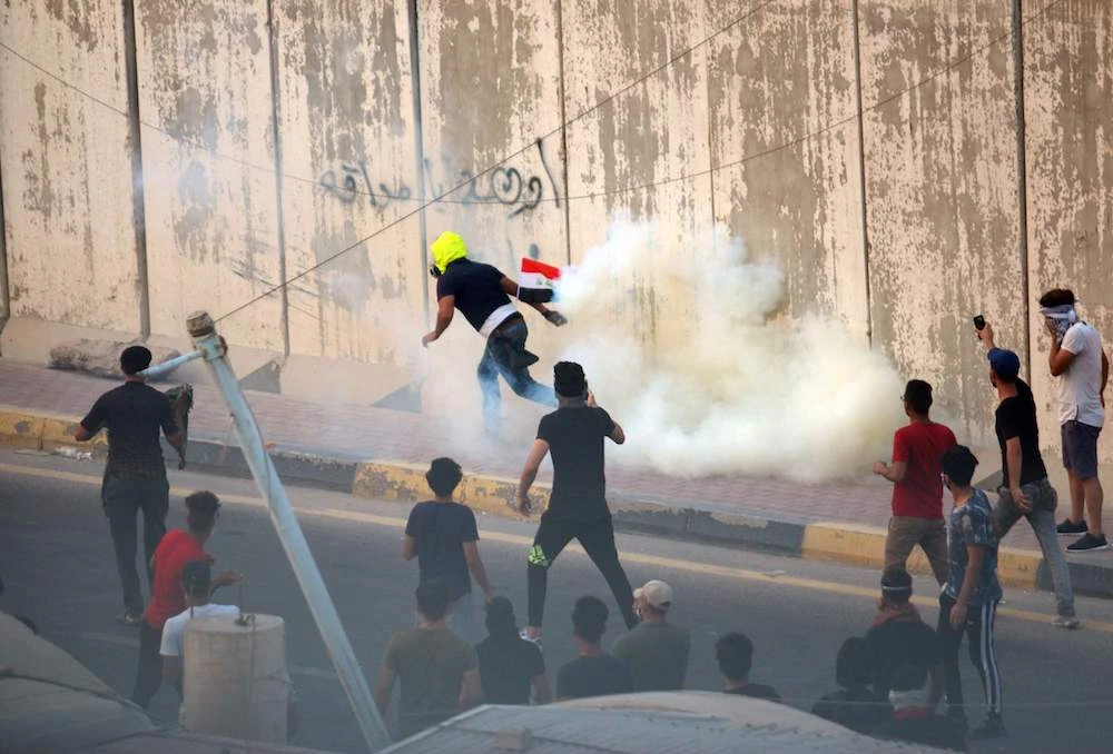 Iraqi protests erupted in Basra on Tuesday after the funeral of a man killed in demonstrations the day before. (AFP)