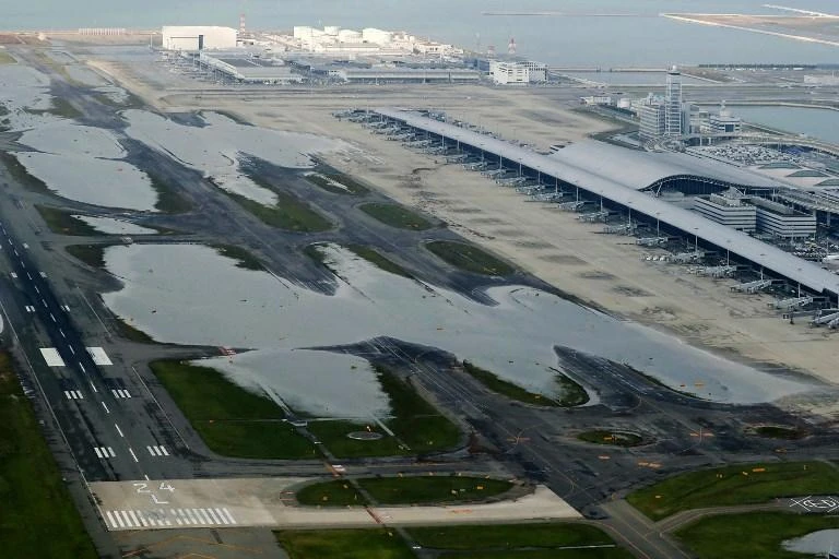 Runways at Kansai International Airport were flooded as high waves washed into the facility on Tuesday. (AFP)