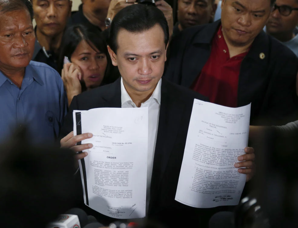 Philippine senator defies Duterte’s arrest order in standoff