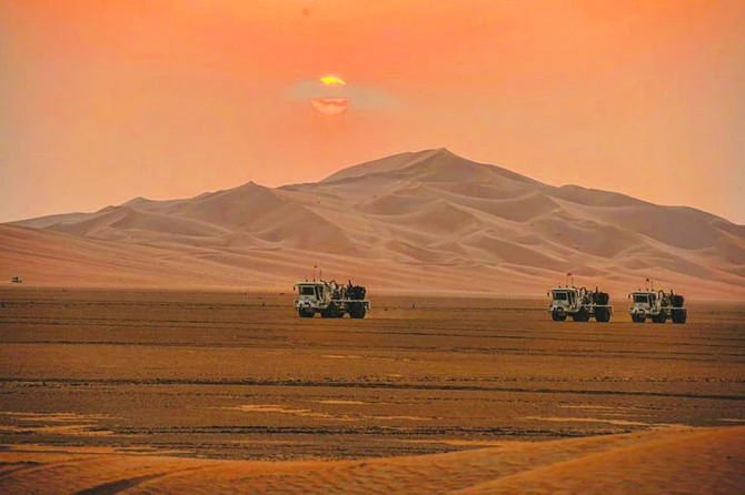 Saudi Aramco has raised the official selling price (OSP) to Northwest Europe by $1.45 a barrel for October. Above, an Aramco exploration team in the Empty Quarter. (Reuters)