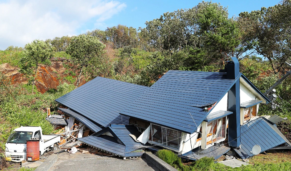 At least four landslides were reported after the quake and six homes had collapsed. (AFP)