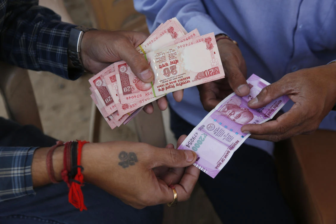 Indian rupee breaches 72 to the dollar to hit new low