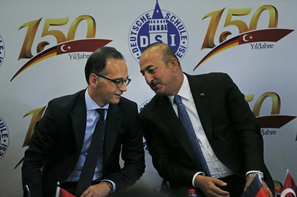 Turkey’s Foreign Minister Mevlut Cavusoglu, right, talks to Germany’s Foreign Minister Heiko Mass, left, during a visit to the German High School, in Istanbul. Maas is on a two-day visit to Turkey where he met with President Recep Tayyip Erdogan and other Turkish officials. (AP Photo)