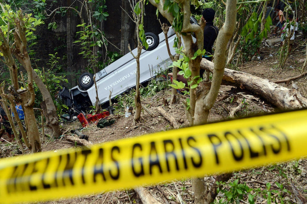 Twenty-one people were killed when a tourist bus plunged into a ravine on Indonesia’s main Java island. (File photo / AFP)