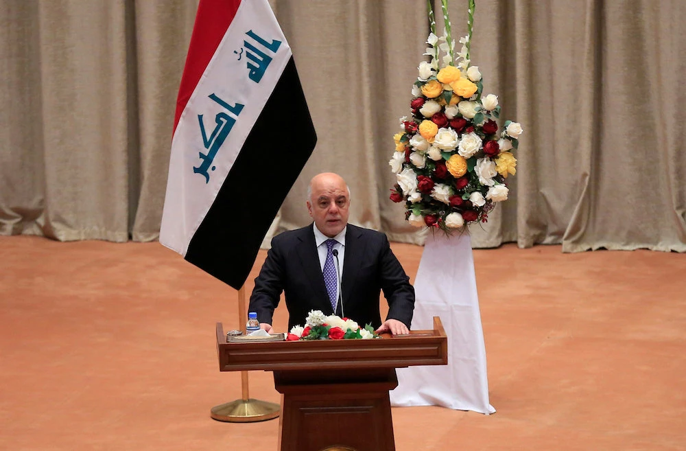 Iraq’s top two parliament groups urge PM to resign