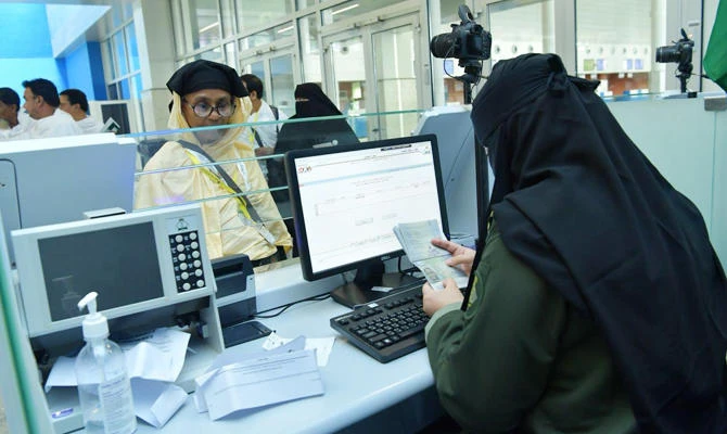 We look forward to bringing change and serving the public, say Saudi female passport staff