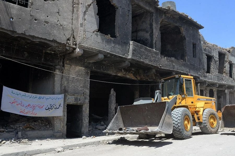 The agency is spearheading the restoration of the city’s market, the central library at its university, two churches and a Yazidi temple. (File/AFP)