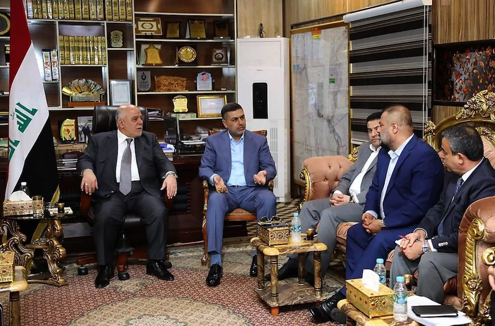 Iraqi Prime Minister Haider Al-Abadi meets local officials in Basra on Monday. (AFP / Iraqi Prime Minister's Office)