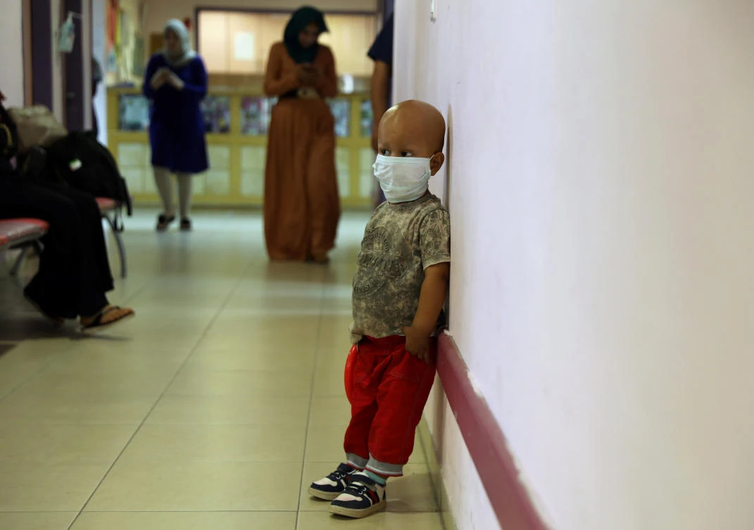 A Palestinian child stands in a corridor of the Augusta Victoria Hospital in East Jerusalem. The West Bank-based Palestinian Authority said it would make up the deficit following a cut in US funding of east Jerusalem hospitals. (Reuters)