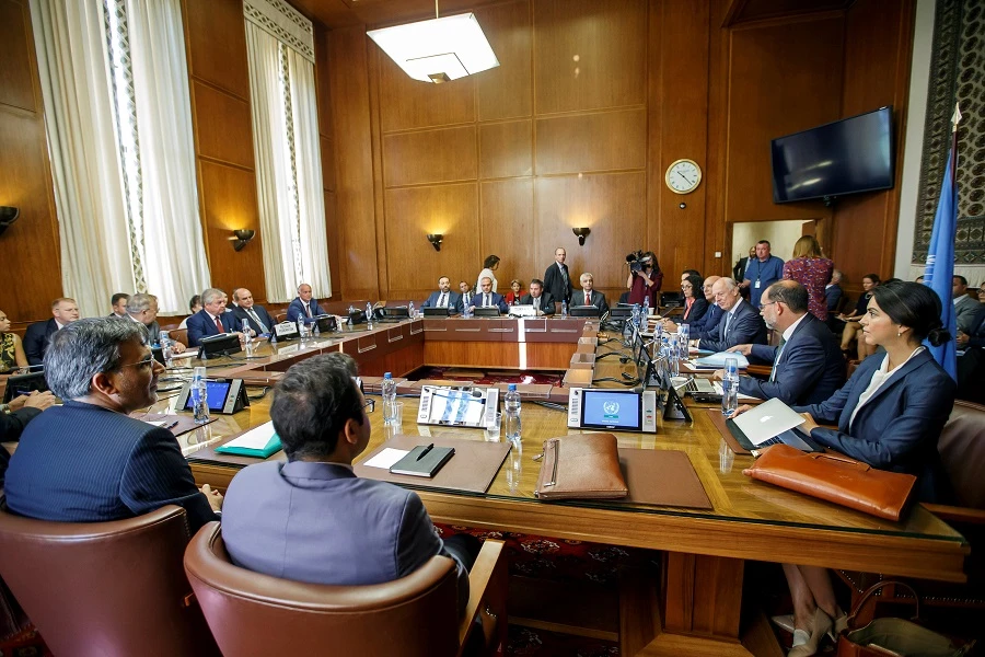 Iran's Deputy Foreign Minister Hossein Jaberi Ansari, Russia's special envoy on Syria Alexander Lavrentiev, Turkish Deputy Foreign Minister Sedat Onal, and U.N. Special Envoy for Syria Staffan de Mistura attend a meeting during consultations on Syria at the European headquarters of the United Nations in Geneva, Switzerland September 11, 2018. (Salvatore Di Nolfi/Pool/Reuters)