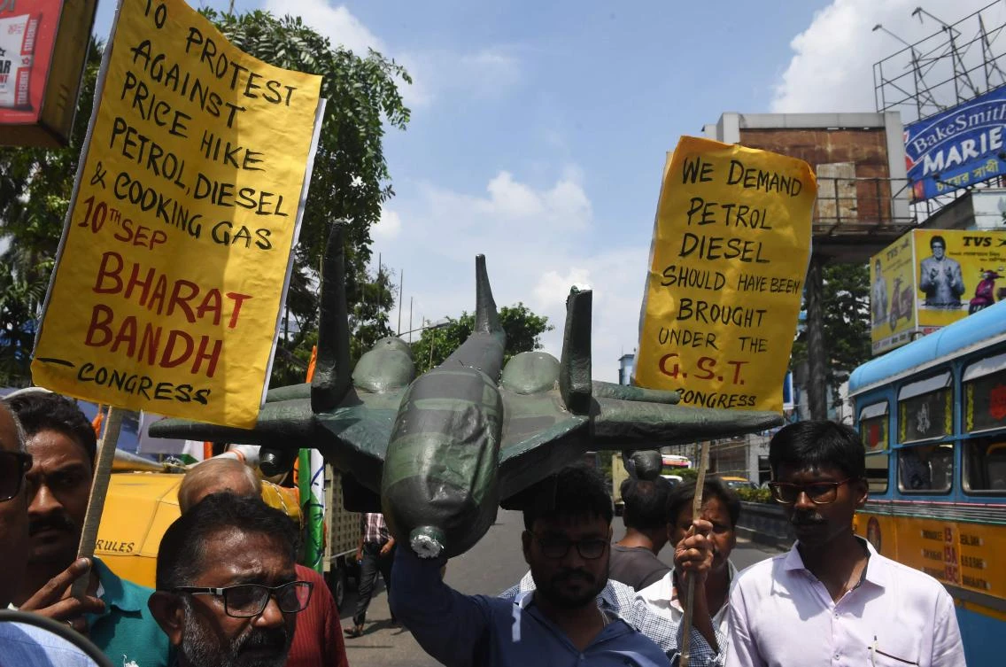 Crowds protest against a fuel price hike in Kolkata on Monday. (AFP)