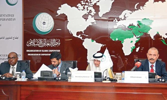 OIC Secretary-General Dr. Yousef bin Ahmed Al-Othaimeen, second right, and Afghan Deputy Foreigner Minister Dr. Nasir Ahmad Andisha, third right, during the OIC meeting in Jeddah. (AN photo by Huda Bashatah)