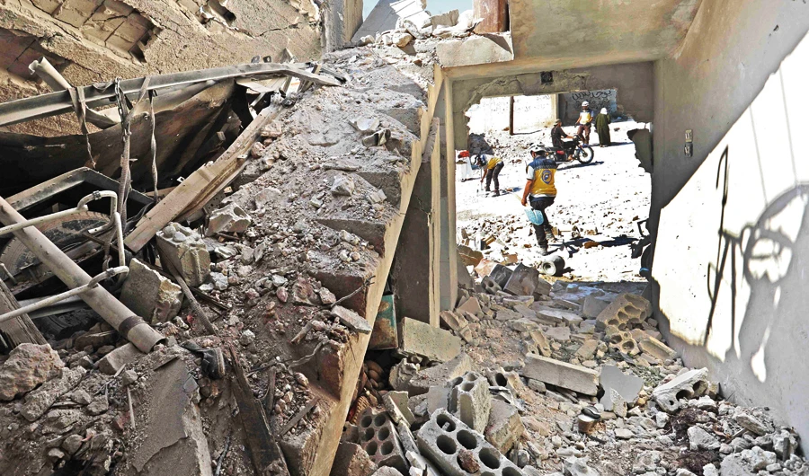 The destruction caused by the regime bombings in the town of Al-Habit on the southern edges of the opposition-held Idlib province. (AFP)