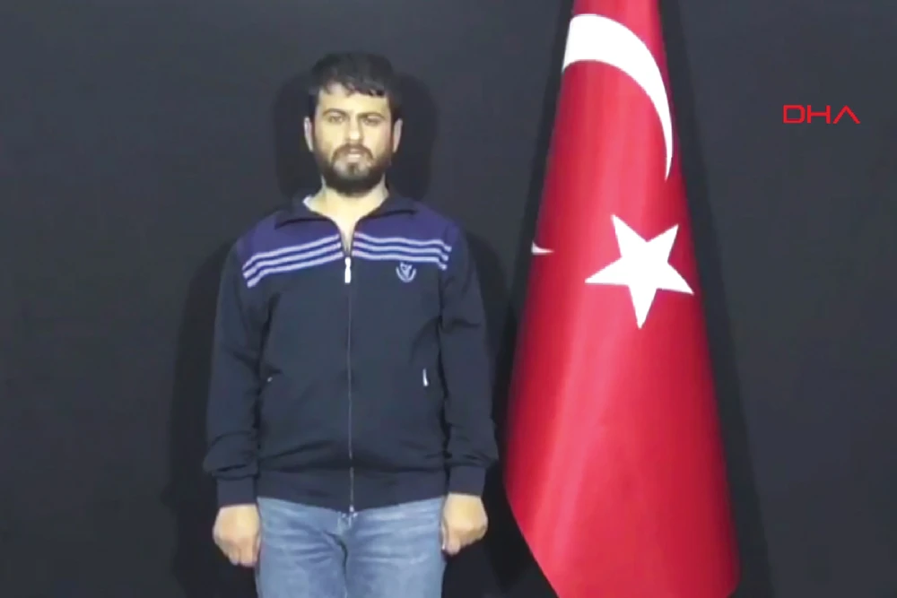 A Demiroren News Agency video grab Wednesday shows Yusuf Nazik, the alleged chief suspect in a 2013 Reyhanli bomb attack. (AFP)