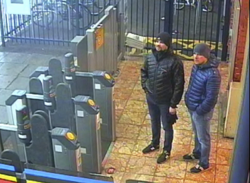 This still taken from CCTV and issued by the Metropolitan Police in London on Wednesday Sept. 5, 2018, shows Ruslan Boshirov and Alexander Petrov at Salisbury train station on March 3, 2018. (AP)
