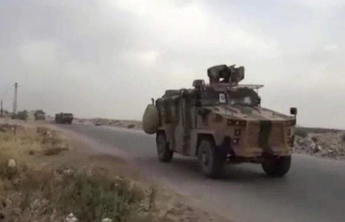 This frame grab from video provided by Central Station for Turkish Intervention, an activist-operated media group monitoring Turkish activities in Syria, that is consistent with independent AP reporting, shows a Turkish military convoy heading to some of the 12 Turkish observations points that ring Idlib, Syria, Thursday, Sept. 13, 2018. (AP)