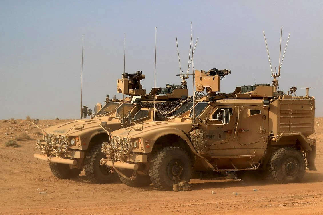 The vehicles of US-backed forces are pictured near the village of Susah in the eastern province of Deir Ezzor, near the Syrian border with Iraq on September 13, 2018. (File/AFP)