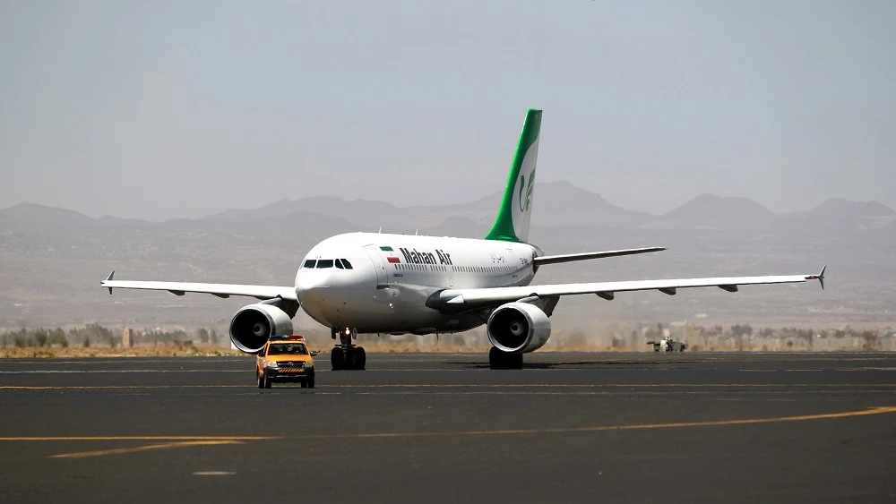 An airplane of Mahan Air sits at the tarmac after landing at Sanaa International Airport in the Yemeni capital on March 1, 2015. (File/AFP)