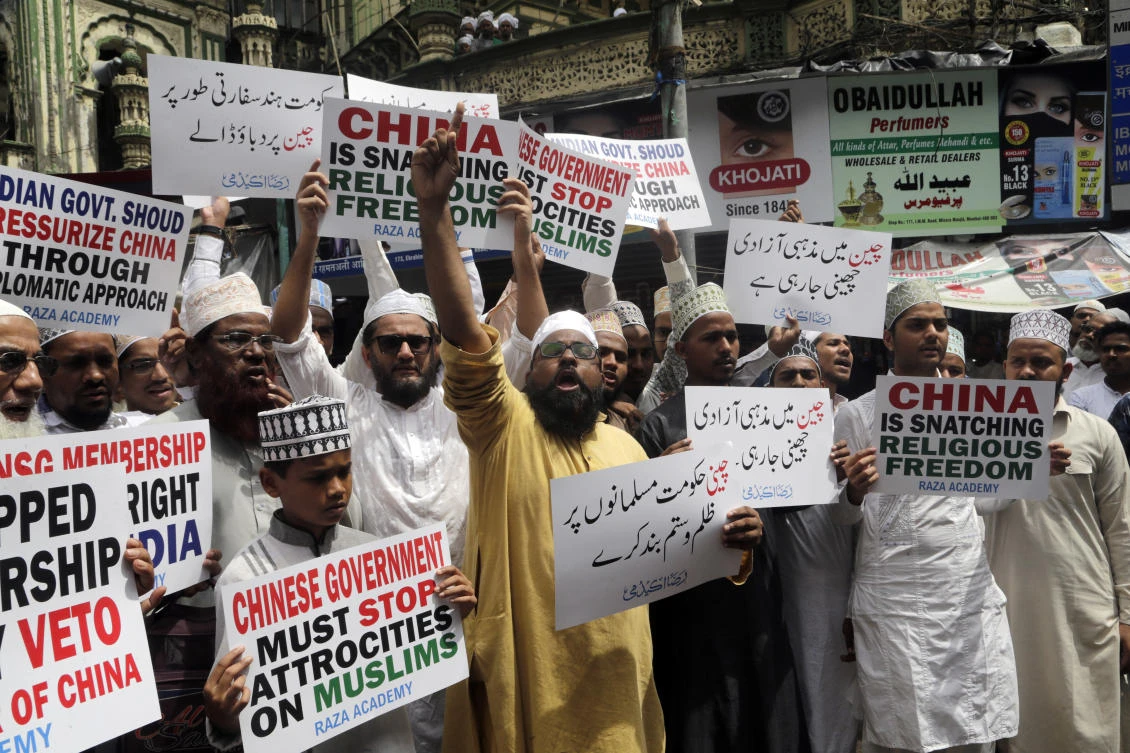 Indian Muslims shout slogans during a protest against the Chinese government, in Mumbai, India, Friday, Sept. 14, 2018. (AP)