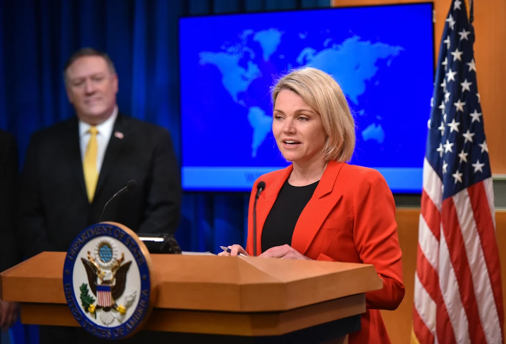 US State Department spokesperson Heather Nauert and Secretary of State Mike Pompeo speak in the Press Briefing Room at the US Department of State in Washington, DC. (File photo / AFP)