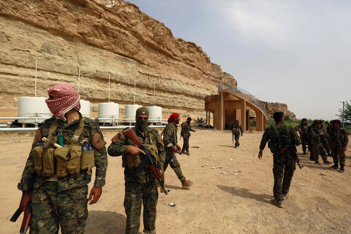 Members of the Syrian Democratic Forces (SDF) are pictured in the village of Susah in the eastern province of Deir Ezzor, near the Syrian border with Iraq on September 13, 2018. (AFP)