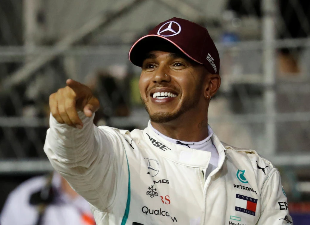 Lewis Hamilton produces ‘magic’ lap to take Singapore pole