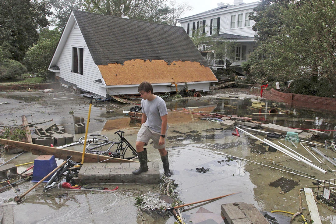 2 storms, Florence and Mangkhut, different as water and wind