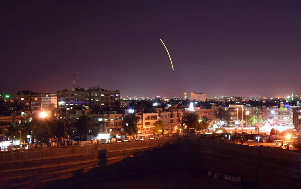A handout picture released by the official Syrian Arab News Agency (SANA) on September 15, 2018, reportedly shows Syrian air defense batteries responding to what the Syrian state media said were Israeli missiles targeting Damascus international airport. (AFP / HO / SANA)