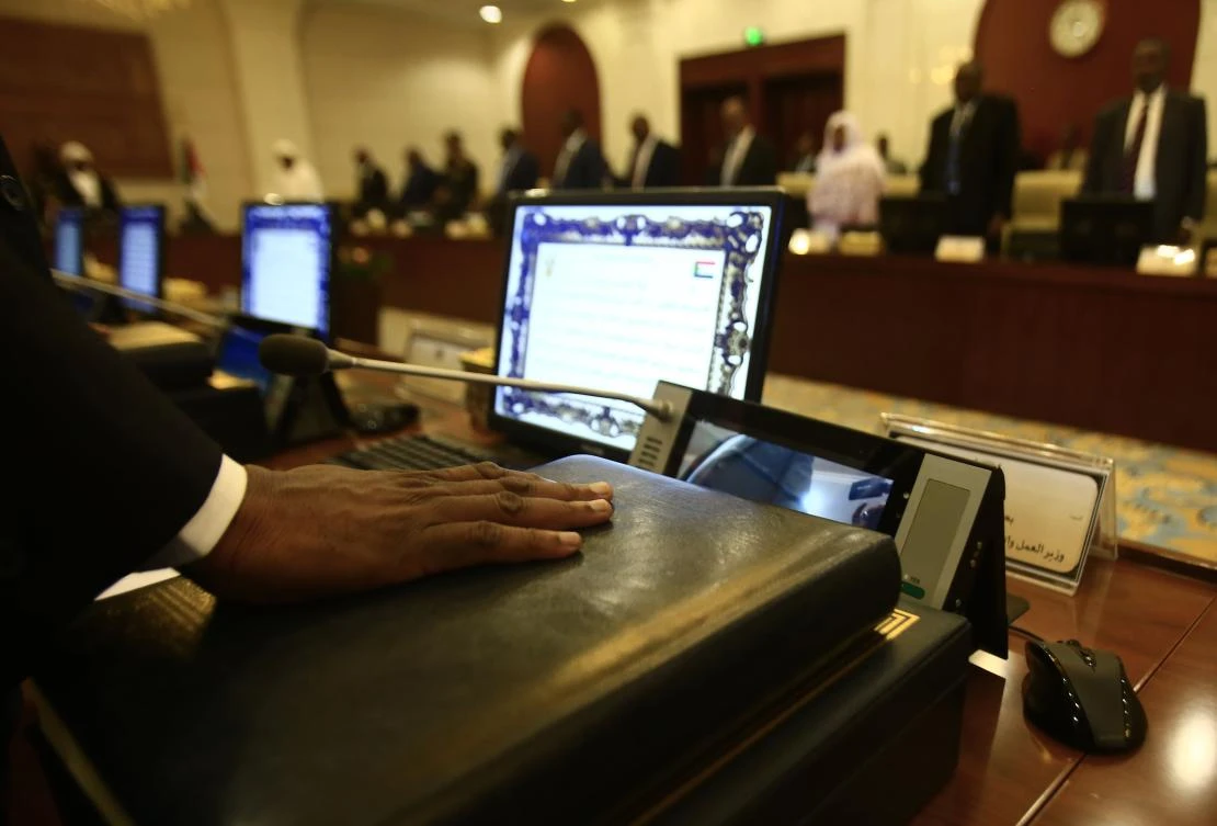 The new Sudanese ministers take the oath of office at the presidential palace in the capital of Khartoum on September 15 2018. (AFP)