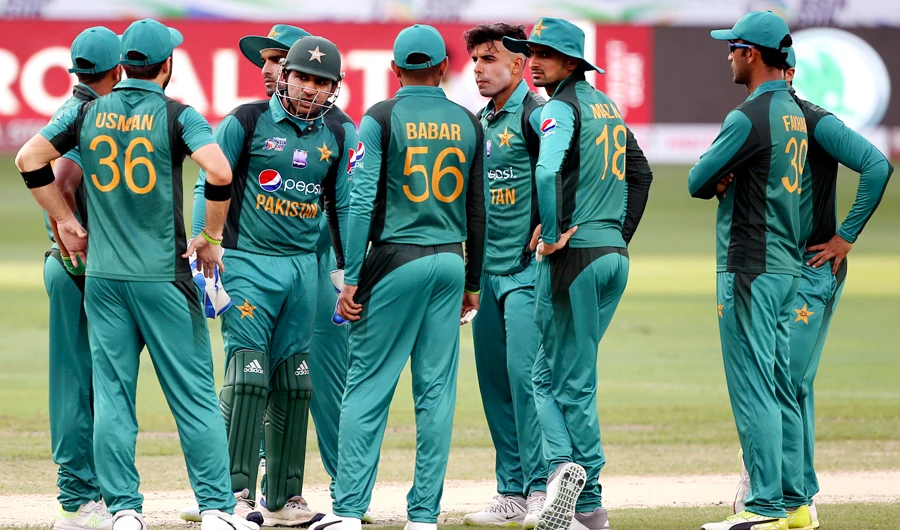 Pakistani players get together to celebrate the dismissal of Hong Kong's Ehsan Khan during the one day international cricket match of Asia Cup between Pakistan and Hong Kong in Dubai, United Arab Emirates, on Sept. 16, 2018. (AP Photo/Aijaz Rahi)