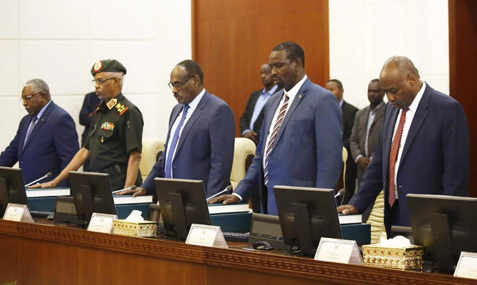 The new Sudanese ministers take the oath of office in Khartoum. (AFP)