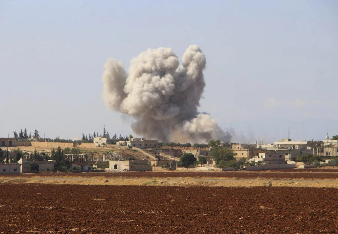 Smoke rising from a Syrian government airstrike, in Hobeit village, near Idlib, Syria. (File/Syrian Civil Defense White Helmets/AP)