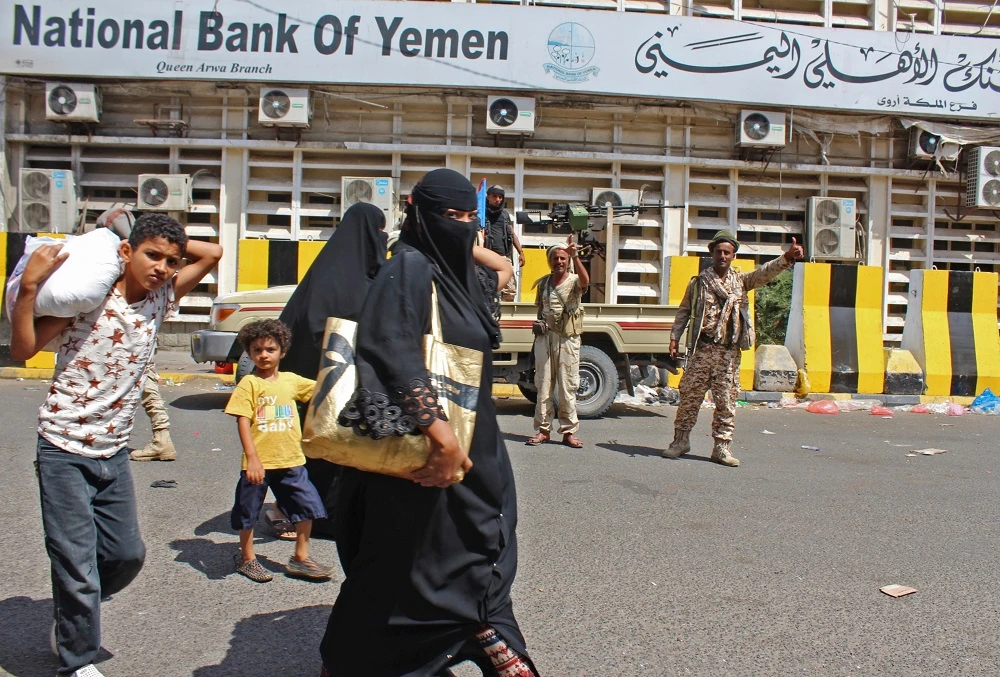 Yemen’s currency has halved in value against the US dollar since the start of a civil war in 2014. (File/AFP)