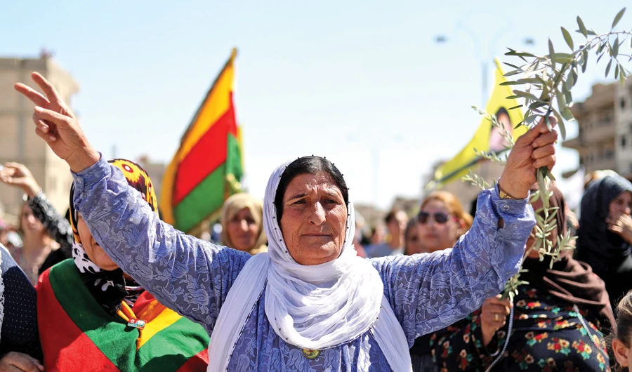 Kurd demonstrators stage a protest rally in Syria’s western Afrin region bordering Turkey. (AFP)