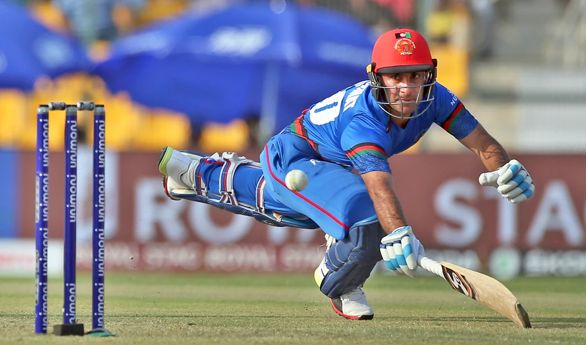 In this file photo, Afghanistan’s Hashmatullah Shahidi dives to successfully make it to the crease during the one-day international cricket match of Asia Cup between Bangladesh and Afghanistan in Abu Dhabi, UAE, Sept. 20, 2018. (AP)