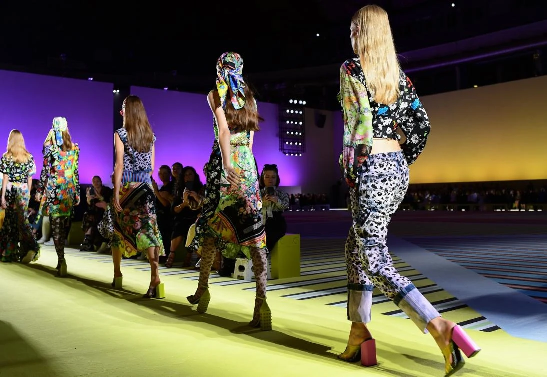 Models present creations for Versace fashion house during the Women’s Spring/Summer 2019 fashion shows in Milan, on September 21, 2018. (AFP)