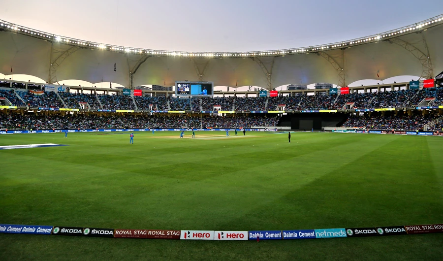 Spectators occupy the stand as they watch the one day international cricket match of Asia Cup between India and Pakistan in Dubai, United Arab Emirates, on Sept. 19, 2018. (AP Photo/Aijaz Rahi)