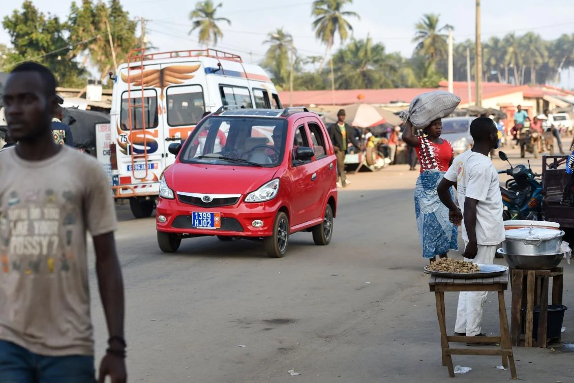 A taxi vehicle with solar energy panels on the roof transports passengers in Jacqueville. (AFP)