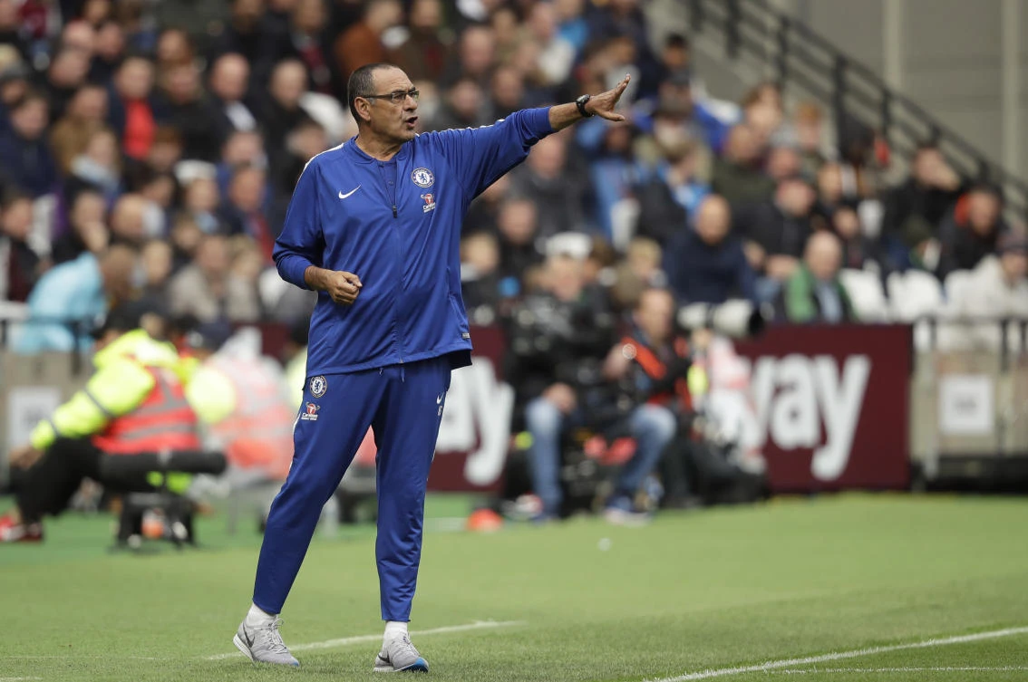 Chelsea head coach Maurizio Sarri gestures during the English Premier League soccer match between West Ham United and Chelsea at London Stadium. (AP)