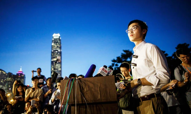In this file photo taken on August 5, 2016, Andy Chan (R), leader of the pro-independence Hong Kong National Party (HKNP), gives a press conference at the start of a rally near the government's headquarters in Hong Kong. (AFP)