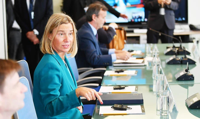 European Union Foreign Affairs and Security Policy High Representative Federica Mogherini is seen at the start of a meeting on Libya hosted by France's Foreign Minister Jean-Yves Le Drian on the sidelines of the UN General Assembly in New York on September 24, 2018. (AFP)