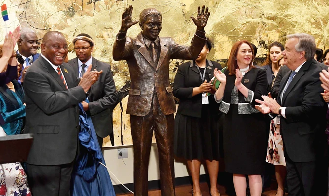 Mandela’s widow urges world: put egos aside and end violence