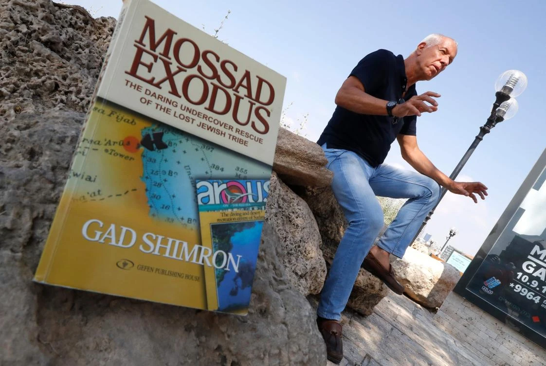 Israeli authgor Gad Shimron speaks during an interview with AFP in the coastal city of Tel Aviv on August 23, 2018. (AFP)
