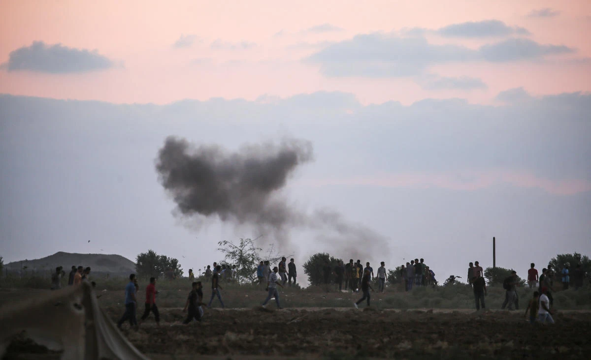 Tihs picture taken on September 21, 2018, in the Gaza Strip near the Israeli border east of Gaza City, shows a smoke plume rising from Israeli bombardment of Hamas observation positions in the Gaza strip. (AFP)