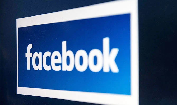 In this file photo taken on March 22, 2018, a computer screen displays the logo of the social networking site Facebook, in Manchester, England. (AFP)